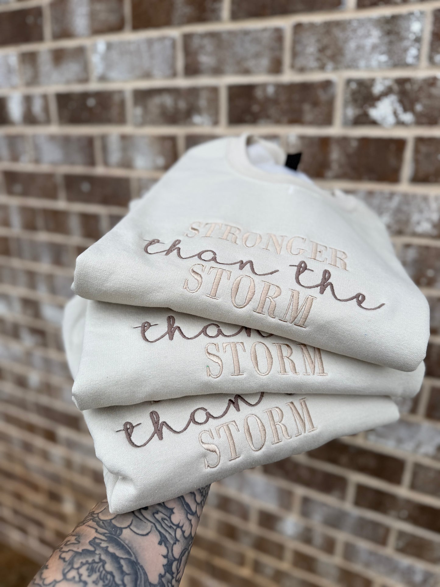 Stronger than the storm embroidery crewneck