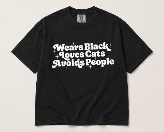 Wears black. Loves cats. Avoids people.  (tee shirt, crewneck or hoodie)