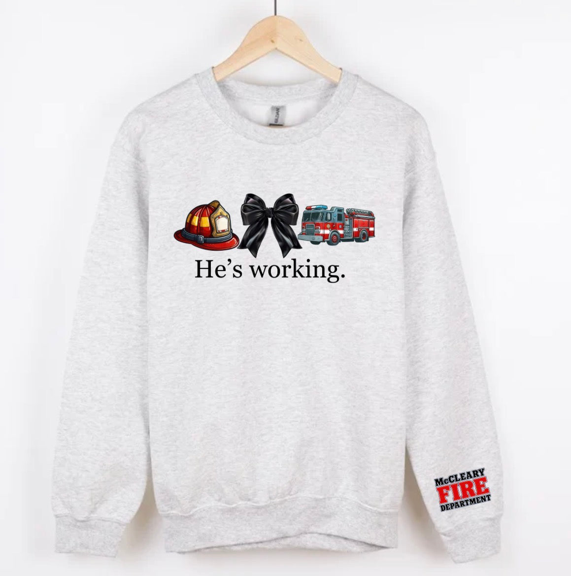 He’s working. McCleary Fire Dept.  (tee shirt, hoodie or crewneck)