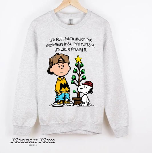 It’s not what’s under the Christmas tree, it’s who’s around it ADULT(tee, crewneck or hoodie )