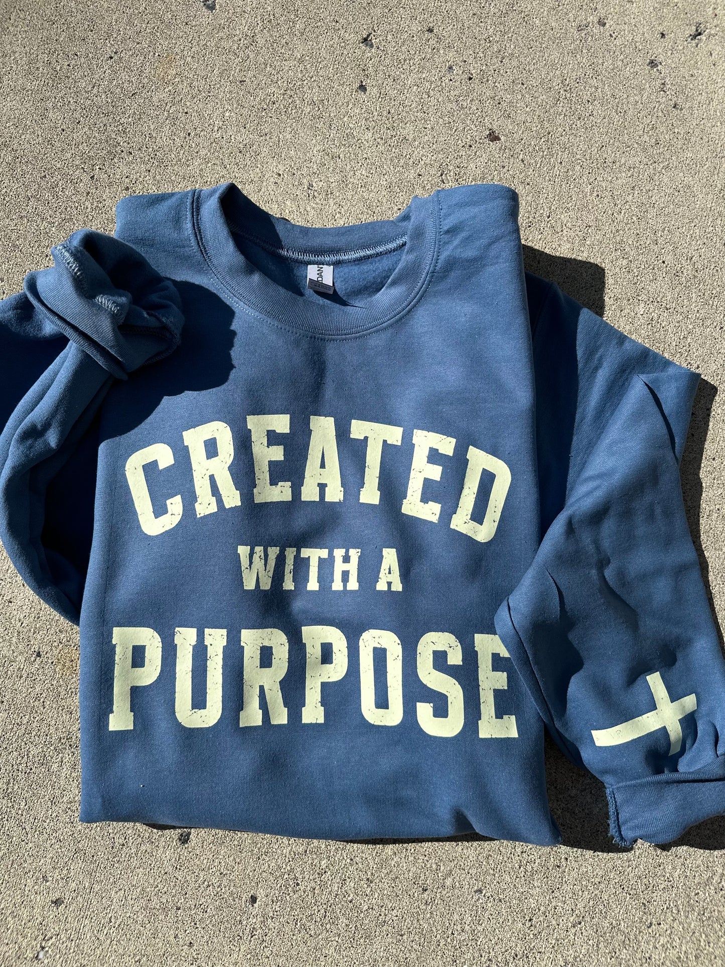 Created with a purpose crewneck (sleeve detail)