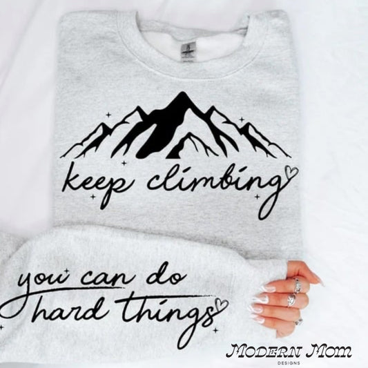 Keep climbing. You can do hard things (sleeve detail) crewneck