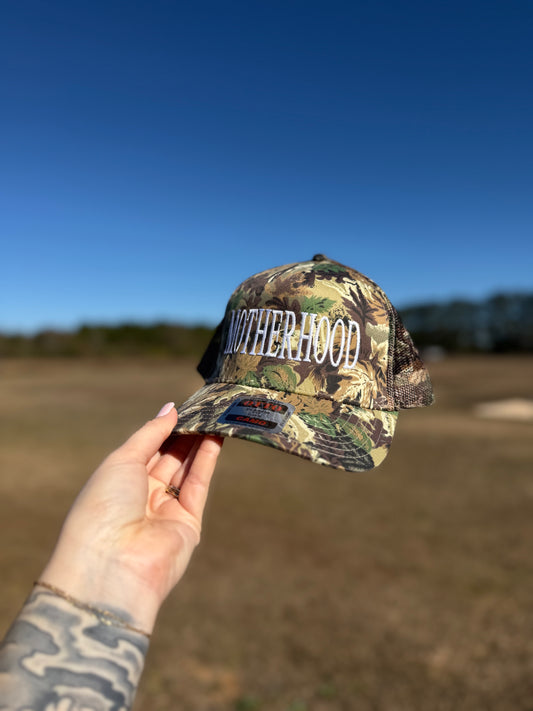 Motherhood camo mesh back truckers